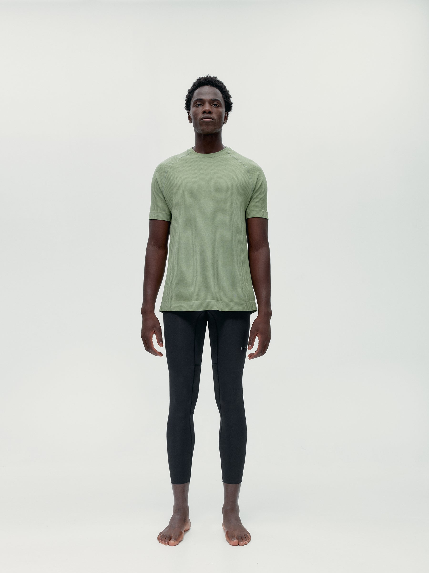 survêtement vert et noir